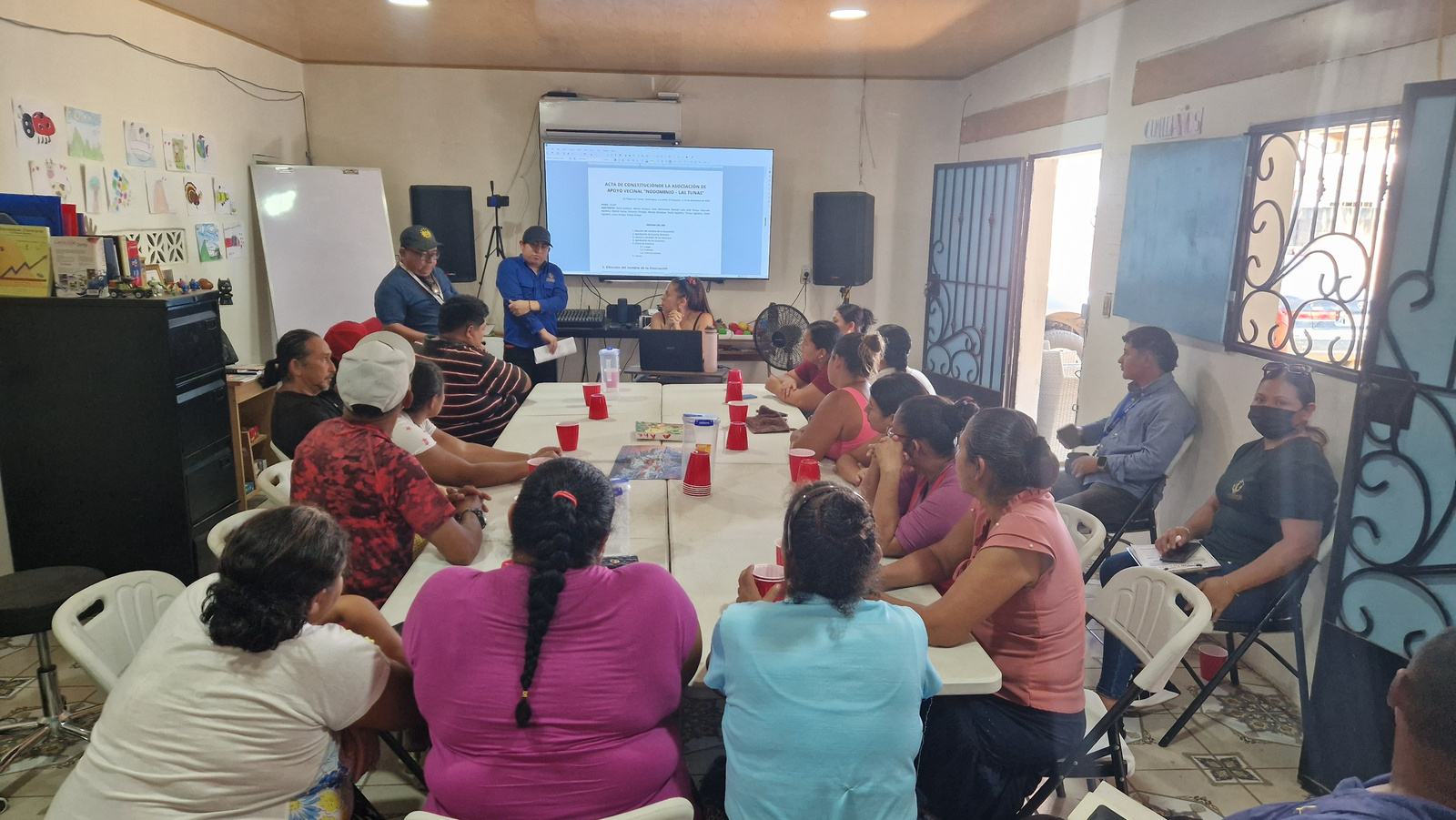 Indoor community meeting in Las Tunas